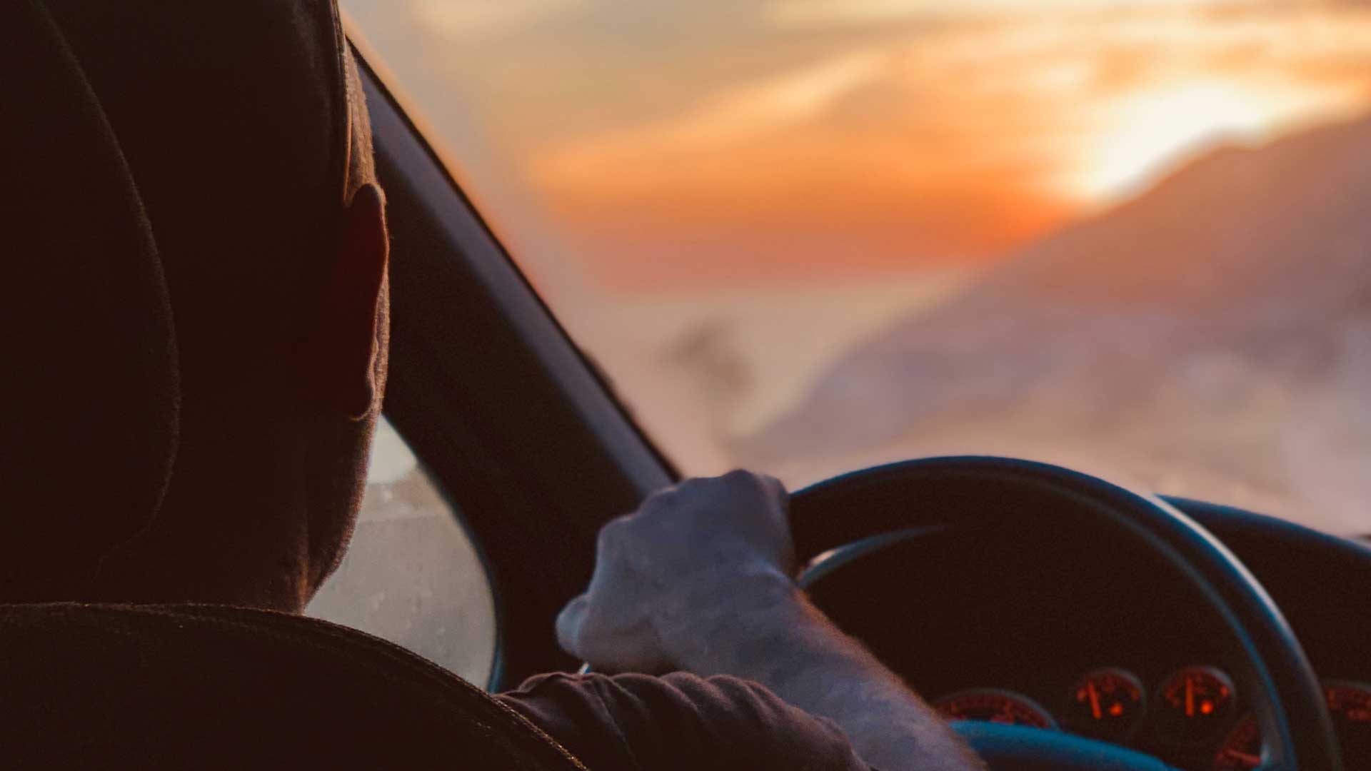 car driver, sunset